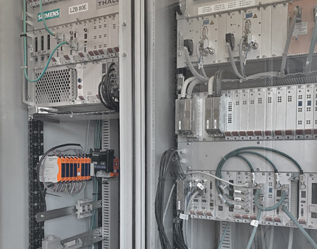 Picture showing RevPi system installed on DIN rail in the control cabinet